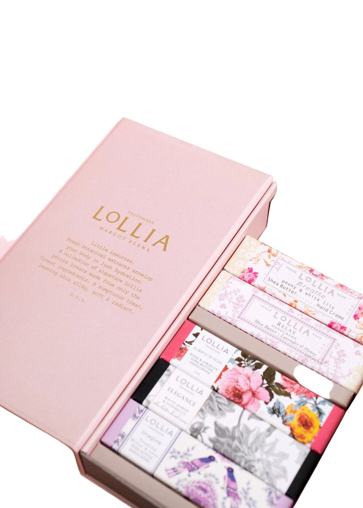 The Margot Elena Lollia Petite Treat Handcreme Gift Set Asst. 2 is open, revealing five nourishing hand creams in floral packaging, neatly arranged inside a pink box with gold embossed text on the lid.
