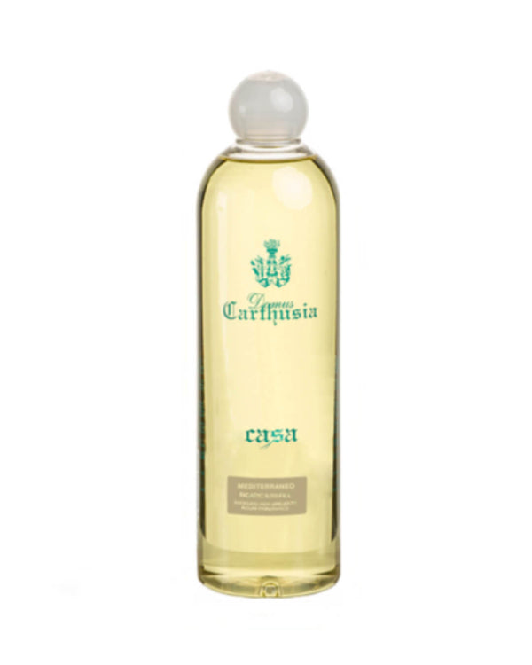 A 500ml Carthusia Mediterraneo Reed Diffuser Refill by Carthusia I Profumi de Capri features light yellow liquid in a tall, clear bottle with green "Carthusia" and "casa" text, crest logo, frosted round cap, and evokes fresh lemon leaves.