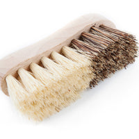 The Andrée Jardin Hard and Soft Fibers Vegetable Brush features French beech wood and dual bristles—soft, light fibers on the left, stiff, dark fibers on the right—displayed against a white background.