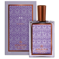 A 75 ml rectangular Molinard MM Eau de Parfum bottle for men, featuring a copper cap and art deco purple-copper geometric pattern, stands before a matching box. This woody amber fragrance is by Molinard.