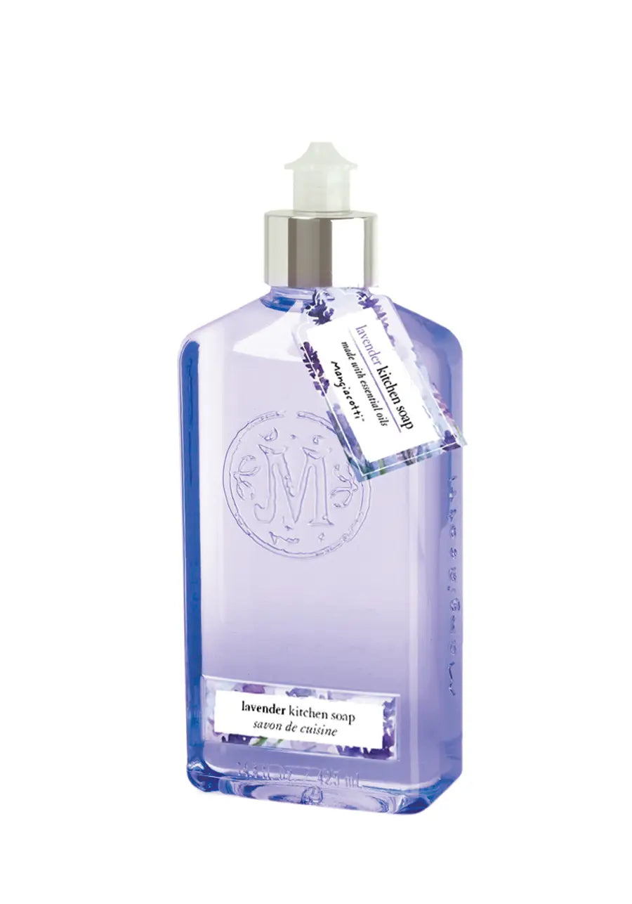 A transparent bottle of Mangiacotti Lavender Kitchen Soap with elegant script and an embossed emblem, featuring a white pump dispenser. The soap, infused with essential oils, is tinted blue.