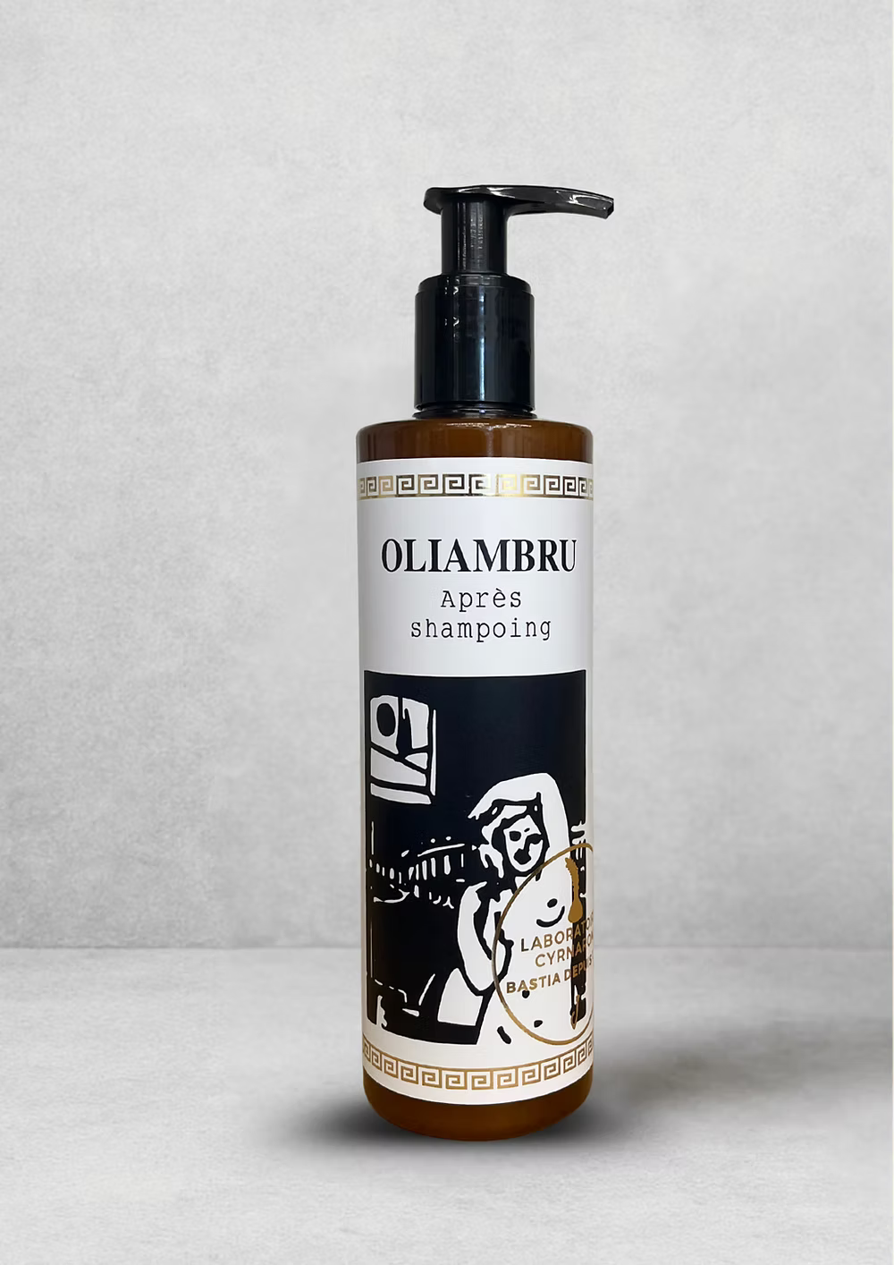 A brown bottle with a black pump labeled "Oliambru Hair Conditioner" by ISULA parfums, featuring an illustrated black and white design, is set against a plain light gray background.