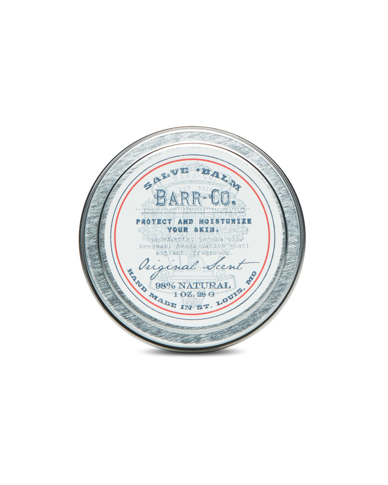 The Barr-Co. Original Scent Hand Salve, a 98% natural balm handmade in St. Louis, MO, promises to moisturize and protect dry skin. Encased in a vintage-style round tin with blue and red accents, it blends care with style under the trusted Barr-Co. brand name.