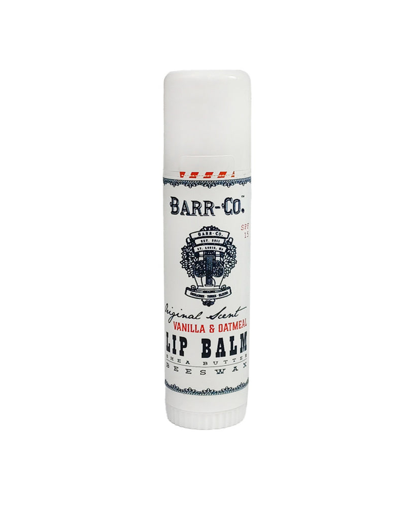A tube of Barr-Co. Original Scent Lip Balm, labeled "original scent vanilla & oatmeal," standing upright against a white background.