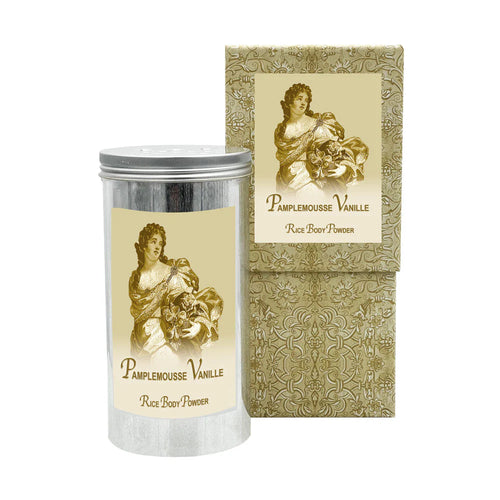 The "La Bouquetiere Pamplemousse Vanille Rice Powder Canister" features a vintage tin with a sepia illustration of a woman holding fruit amid ornate floral patterns. Infused with natural fragrances, it exudes timeless elegance.