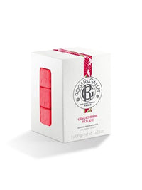 A white box of Roger & Gallet Red Ginger Wellbeing Soaps (3 x 3.5 oz) with the logo and red accents reveals three pink bars made with naturally derived ingredients, inspired by French perfumery excellence.