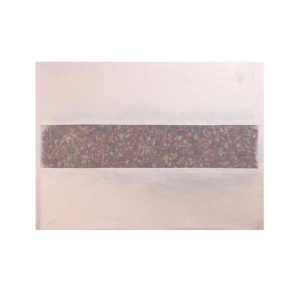 A rectangular white tea bag with a clear center, showing a blend of dried tea leaves and herbs—evoking the fresh aroma of elizabeth W Rose Drawer Liner Pink Linen.