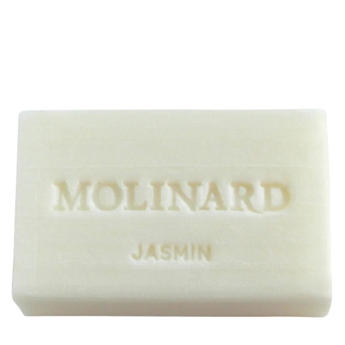 A rectangular white bar of Molinard Soap - Jasmin with "MOLINARD" and "JASMIN" embossed—premium French perfumery in your bath.