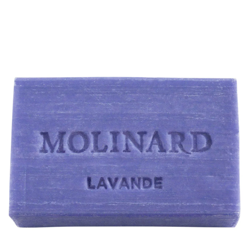 A rectangular purple bar of Molinard Soap - Lavender from Molinard, embossed with "MOLINARD LAVANDE," sits against a plain white background.