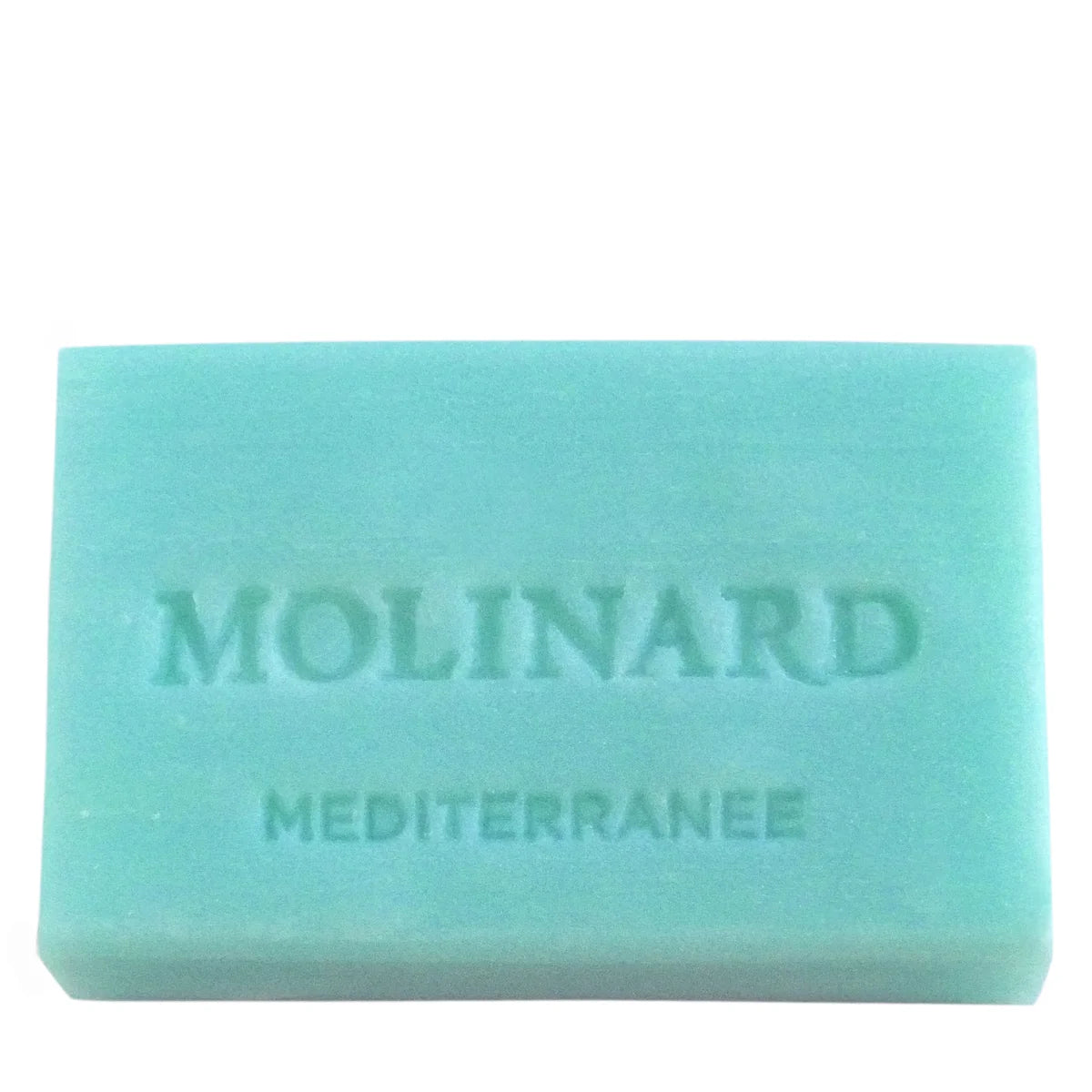 Molinard Soap - Méditerranée by Molinard is a turquoise rectangular bar, embossed with "Molinard" and "Méditerranée," offering a refreshing Mediterranean scent.