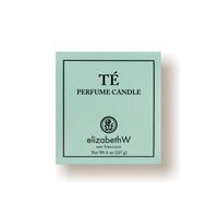 Top-down view of a square elizabeth W Signature Té Candle hand-poured candle box in teal color with elegant black text and logo design, isolated on a white background.