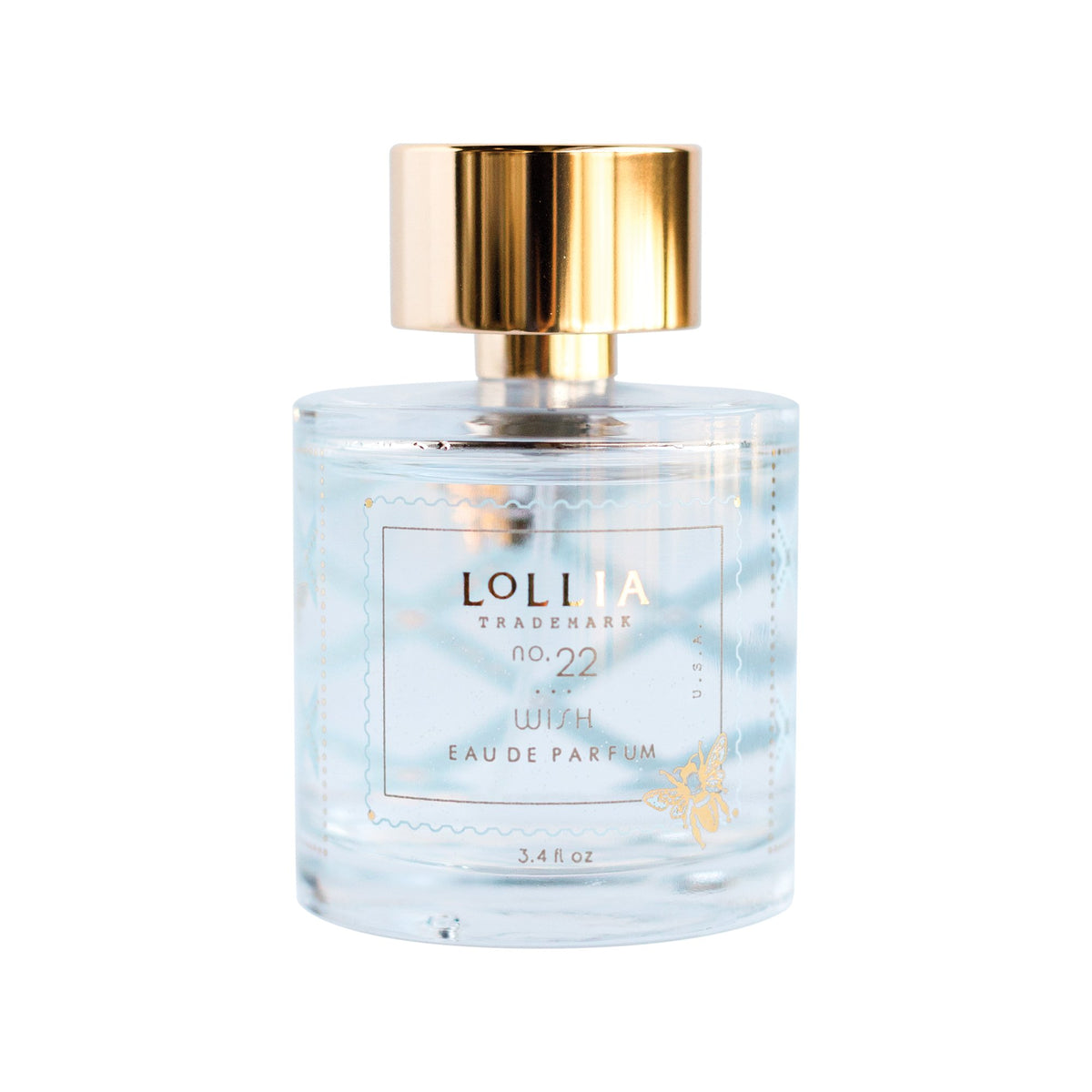 A clear glass perfume bottle labeled "Lolia Wish Parfum Bundle" by Fast Bundle, with gold accents, a shiny gold cap, and containing light blue liquid.