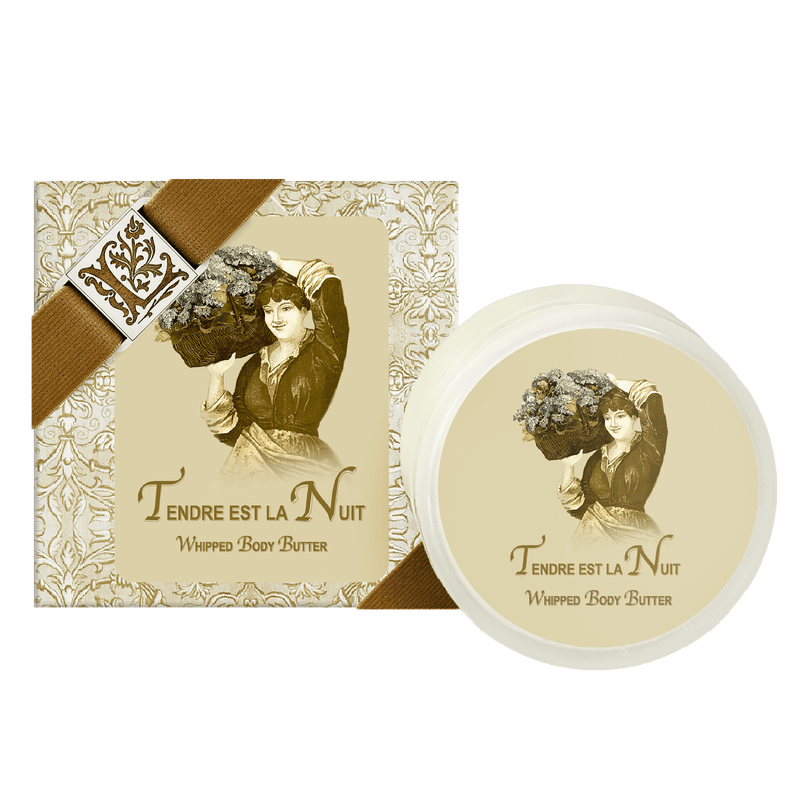 A La Bouquetiere Tendre est la Nuit Shea Butter Whipped Body Butter set; a labeled rectangular box and a circular jar, both featuring an illustration of a woman holding flowers and the text “tendre est la nuit shea butter whipped body.”