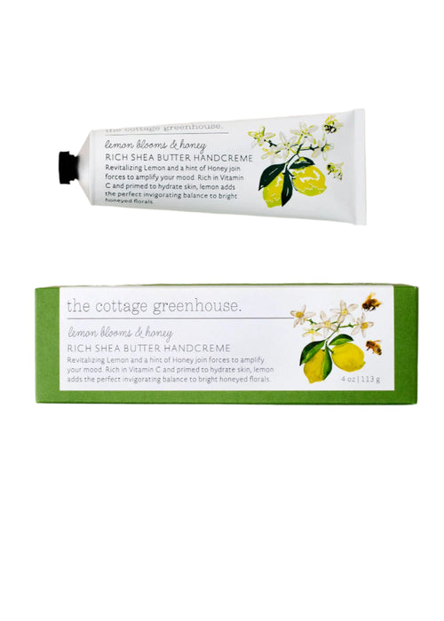 Margot Elena's The Cottage Greenhouse Lemon Blooms & Honey Handcreme, in beautifully illustrated packaging with lemon branches and flowers, hydrates deeply with Vitamin C, shea butter, and avocado oil while highlighting the refreshing essence of lemon and honey.