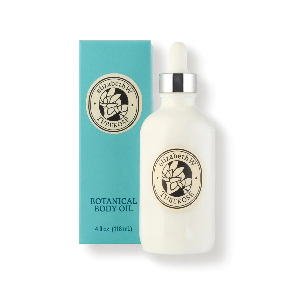 A white bottle with a dropper labeled "elizabeth W Botanist's Scent Lab Tuberose Body Oil" stands beside its matching teal box, exuding a luxurious fragrance. Both feature a circular floral logo and are infused with jojoba and sweet almond oil. The bottle contains 4 fl oz (118 ml) of indulgence.