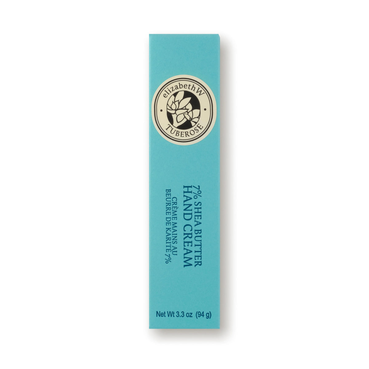 A turquoise rectangular box featuring a circular logo at the top marked with "elizabeth W Botanist's Scent Lab Tuberose Hand Cream" emphasizes its rich 7% shea butter formula. Enriched with botanical extracts, the description is presented in both English and French. The net weight is 3.3 oz (94g).