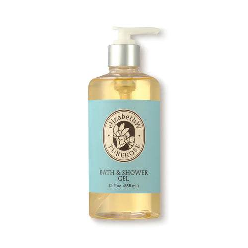 A clear plastic bottle with a white pump dispenser contains a luxurious gel labeled "elizabeth W Botanist's Scent Lab Tuberose Shower Gel." The golden-yellow liquid offers a gentle lather and exudes a delightful tuberose scent. The light blue label features a black circular logo and text, and the bottle is 12 fl oz (355 ml) in size.