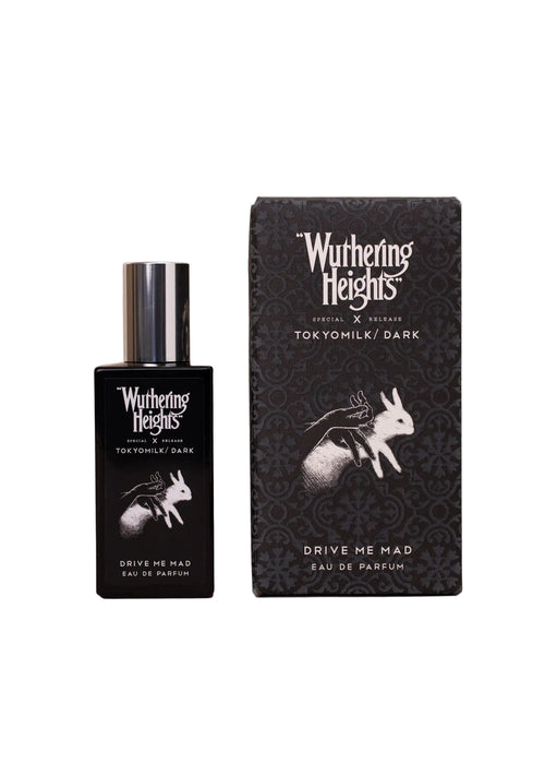 Wuthering Heights perfume bottle and packaging on a beige background