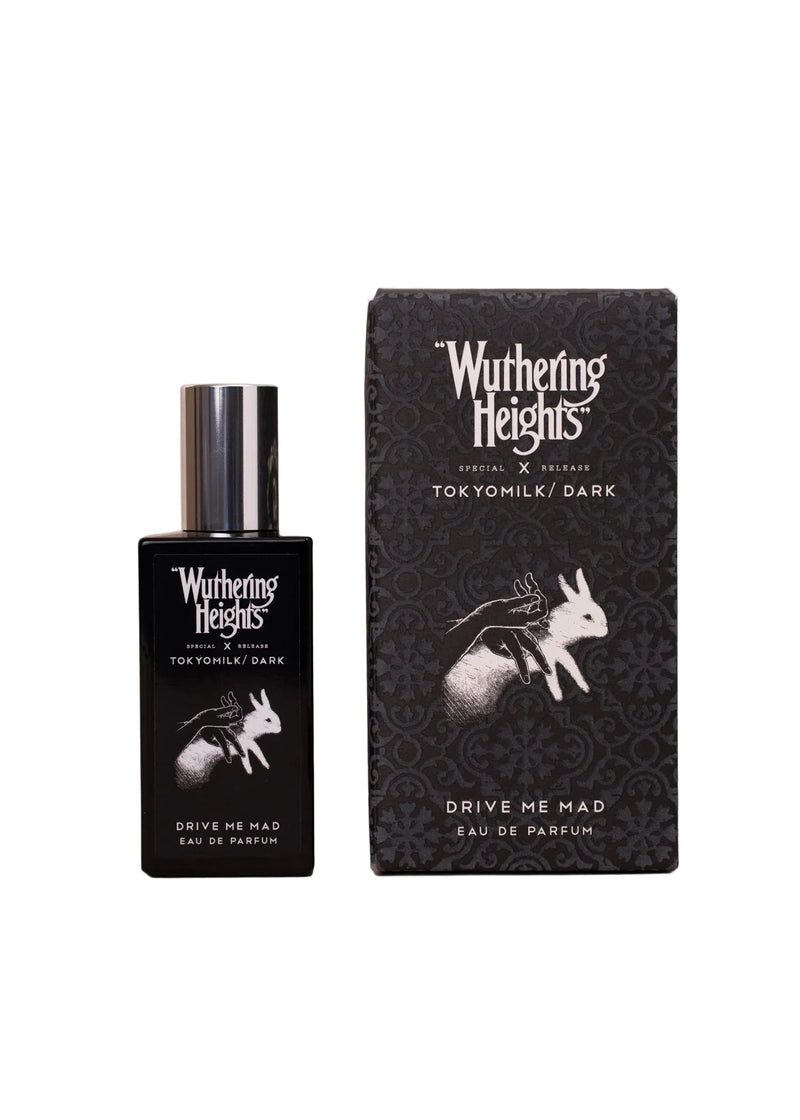 Wuthering Heights perfume bottle and packaging on a beige background