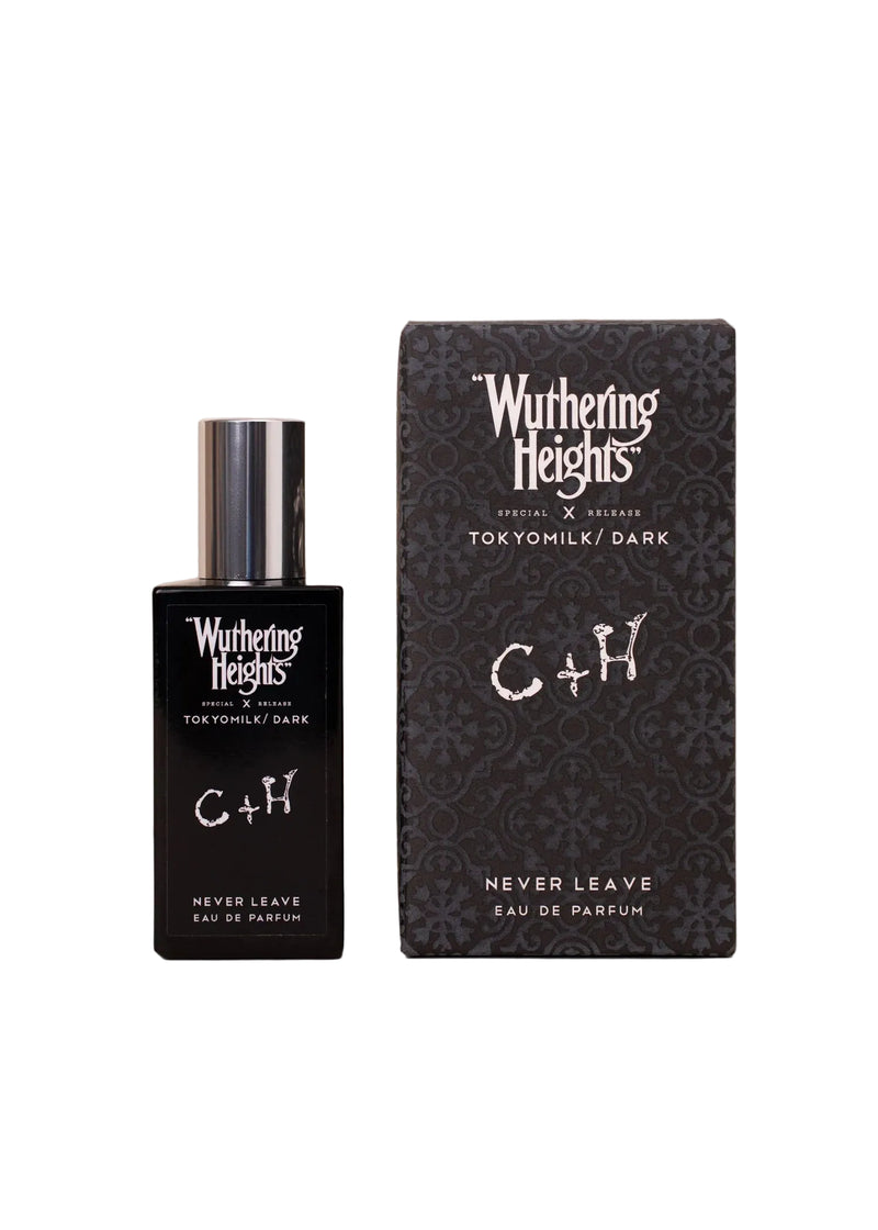 A black bottle of Margot Elena's TokyoMilk Dark "WUTHERING HEIGHTS" Never Leave Eau de Parfum sits beside its box, highlighting the fragrance’s mysterious, botanical allure.