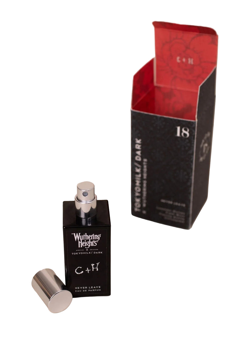 Perfume bottle and packaging with 'C+H' branding on a light background