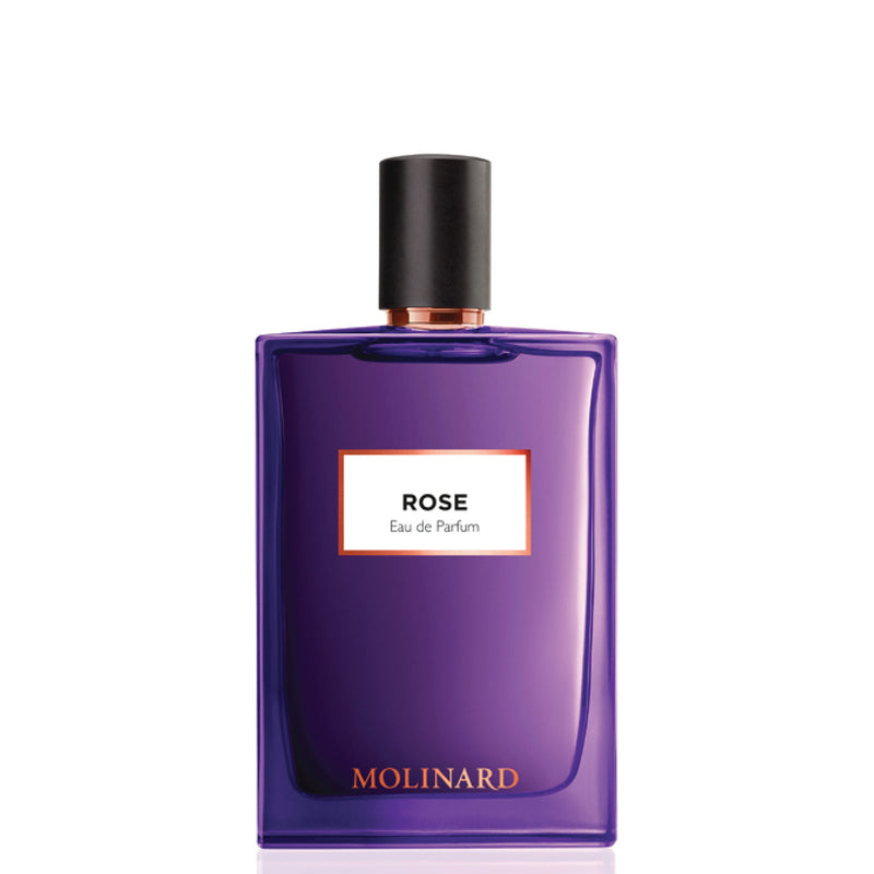 A bottle of Molinard Rose Eau de Parfum by Molinard on a white background, featuring a square, purple glass container with a black cap and a white label with orange borders