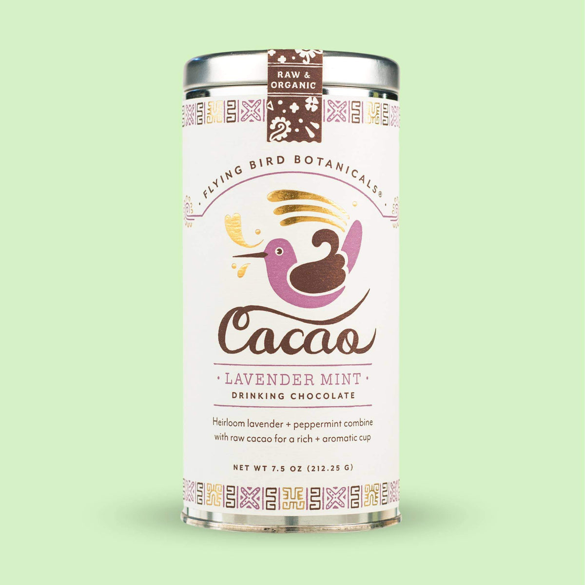 A large tin of Flying Bird Botanicals Lavender Mint Cacao drinking chocolate, featuring ornate patterns and a playful bird illustration on a mint green background.