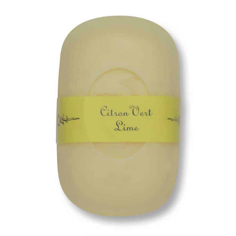 A bar of pale yellow La Lavande sweet almond soap with a yellow wrapper labeled "citron vert lime" in elegant script, centered on a plain white background.