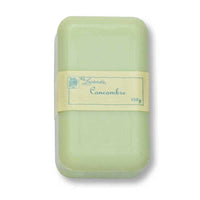 A pale green bar of soap with a cream-colored wrapper labeled "La Lavande Joie de Vivre Cucumber Hand, Face and Body Soap 150g" against a plain white background.