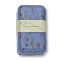 A bar of La Lavande Joie de Vivre Lavender Flowers Soap with visible flecks of French Lavender Flowers, packaged in a wrapper labeled "legends fleurs de lavande 450g," against a white background.