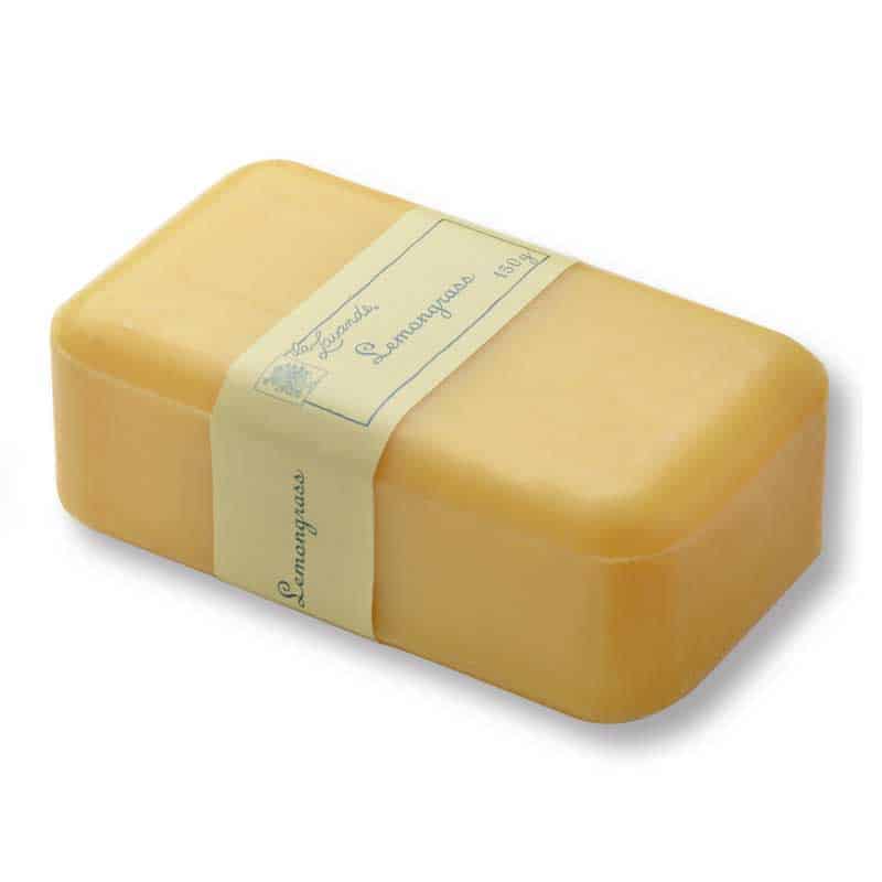 A block of La Lavande Joie de Vivre Lemongrass Soap - 150gm with a white label on top, inscribed with handwritten text on a neutral background.