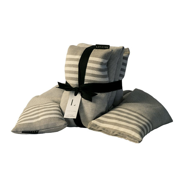 Four Lavande - Lavender Stress Pillows filled with lavender buds, tied with a black ribbon, labeled 'lavande', isolated on a white background.