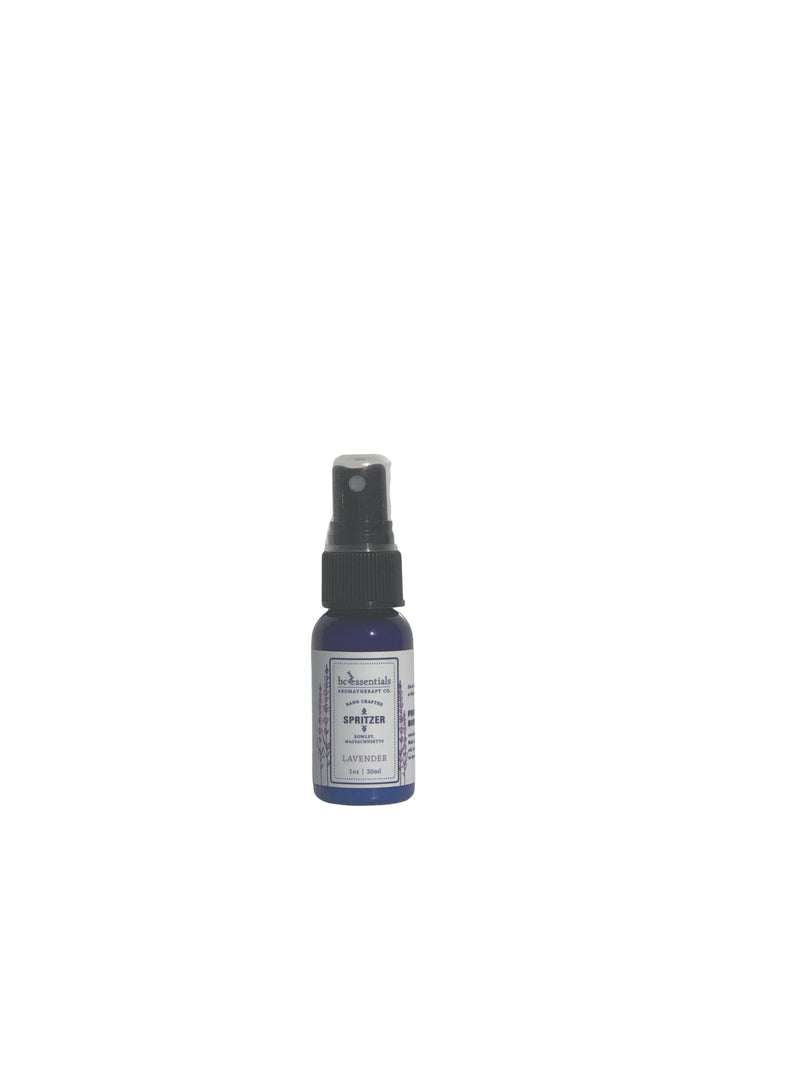 A small blue glass spray bottle for BC Essentials Lavender Spritzer - 1 oz isolated on a white background.