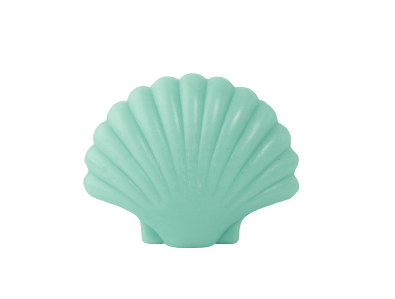 A mint green ceramic La Lavande Shell Soap shaped like a scallop shell, isolated on a white background.