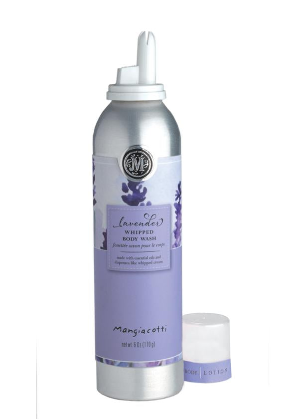 A luxurious silver canister of Mangiacotti Lavender Whipped Body Wash with a small white lid beside it, both on a white background. The bottom of the canister also features a label for body lotion.