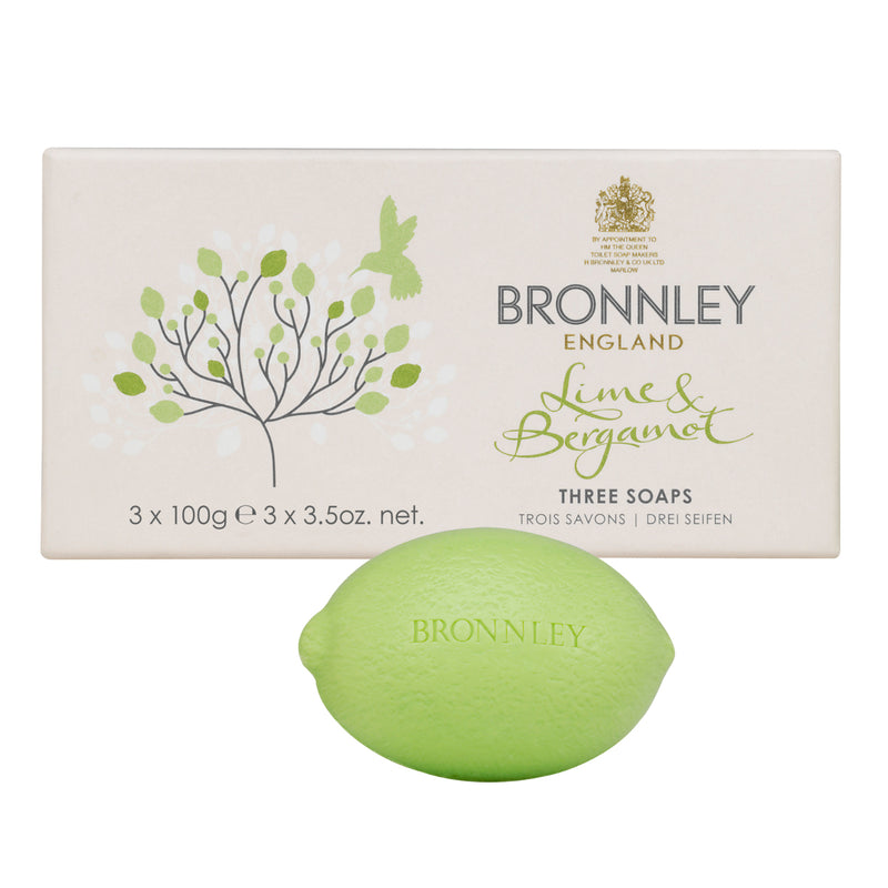 A Bronnley English Soaps product image featuring a box of Bronnley Lime & Bergamot Soap - 3x100gm Hand Soap with three 100g bars and a single green lime-shaped soap displayed in front. The packaging has