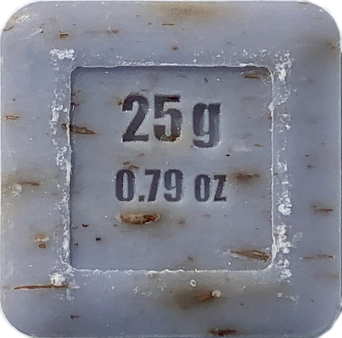 Close-up of a square label on La Lavande Lavender Flower Guest Soap 25gm reading "25g" and "0.79 oz," surrounded by lavender flowers, and embedded in a textured surface.