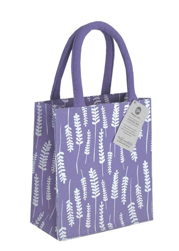 A purple Mangiacotti Lavender Everyday Tote Bag adorned with a white fern pattern, featuring sturdy handles and an attached rectangular label.
