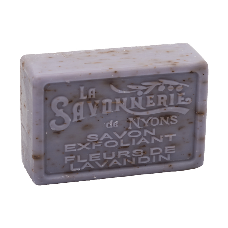 A bar of La Savonnerie de Nyons Provence Lavender Exfoliating Soap 100g, isolated on a white background. The soap, highlighting French manufacturing, is rectangular and spe