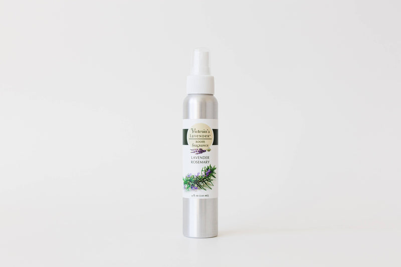 A silver spray bottle with a label that reads "Victoria's Lavender - Lavender Rosemary Home Fragrance 4 oz" against a plain white background. The label features an image of lavender and rosemary and mentions its Victoria's Lavender.