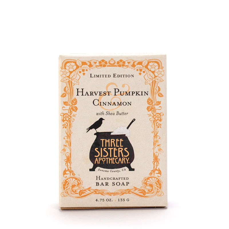 A limited edition bar of Three Sisters Apothecary Harvest Pumpkin & Cinnamon Bar Soap displayed against a plain background. The packaging features elegant orange designs.