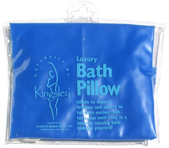 A packaged Bath Accessories luxury bath pillow in blue packaging with text and product description visible. The pillow, featuring suction cups for secure attachment, is designed to be inflated to desired firmness and attached to a
