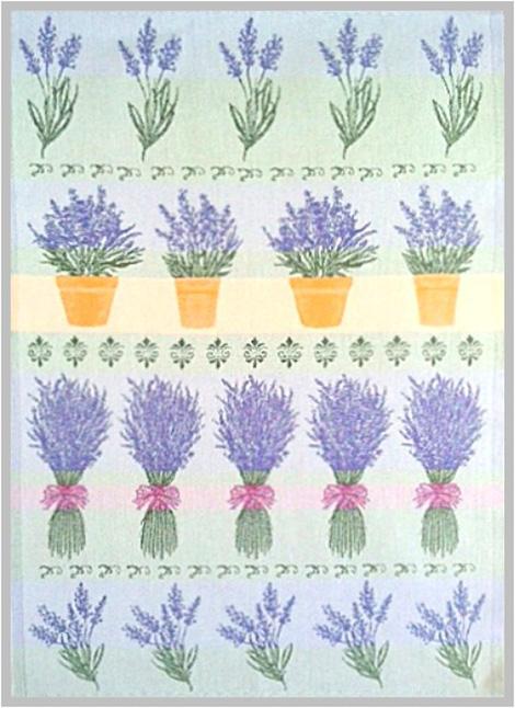 The image displays a European Tea Towel from Mierco adorned with repeated patterns of Swedish Lavender plants. Some lavenders are in orange pots, others are tied with pink ribbons, interspersed with Hebrew text and elements.