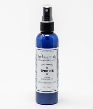 Blue glass spray bottle labeled "BC Essentials - Respiratory Relief Spritzer, 4 oz, Spruce & Eucalyptus, Sinus Congestion Relief" on a white background.