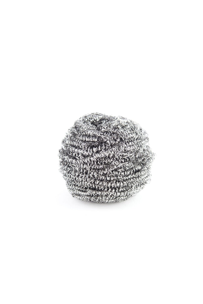 A single Andrée Jardin Tradition Stainless Steel Scrubber isolated on a white background, showing its textured and coiled wire material.