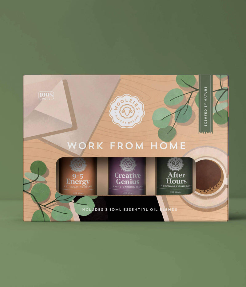 Packaging of Woolzies Work From Home Set Of 3 essential oil blends featuring labels such as "9-5 Energy," "Creative Genius," and "After Hours" with a modern, leafy design on a green.