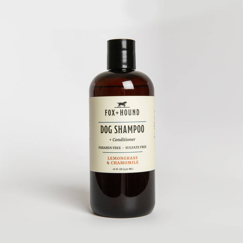 A bottle of Fox + Hound Lemongrass & Chamomile Dog Shampoo + Conditioner, displayed against a white background.