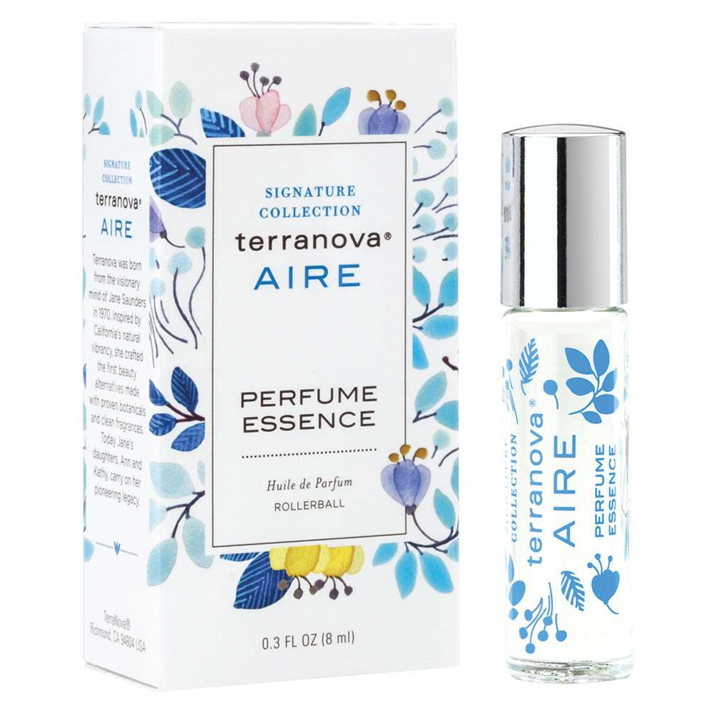 A boxed Terra Nova Aire perfume essence rollerball and the perfume bottle itself, displaying floral and leaf designs in blue and yellow on a white background.