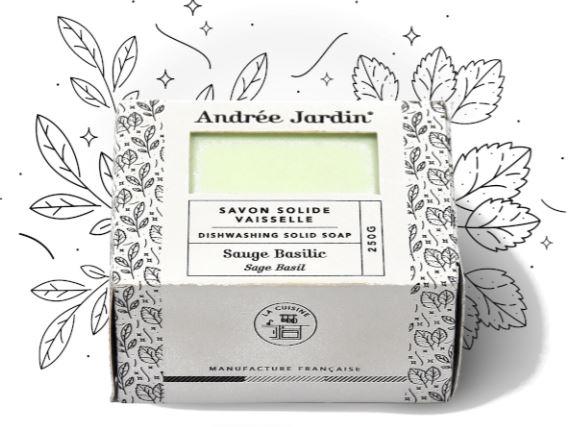 A bar of Andrée Jardin Solid Dish Washing Soap Sage Basil, labeled "savon solide vaisselle," with sage basil scent, packaged in a box decorated with leafy and starry illustrations.