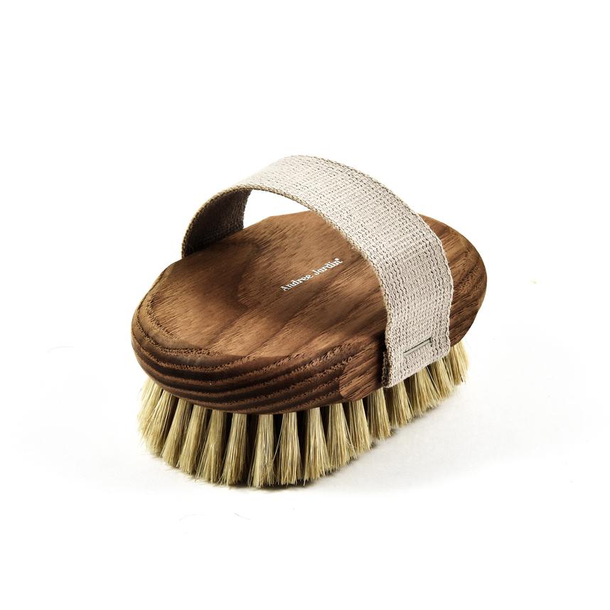 Andrée Jardin Tradition Ash Wood Massage Brush with natural bristles and a woven strap, isolated on a white background.